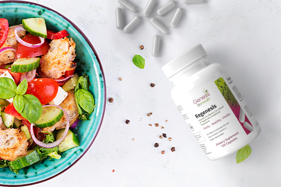 A vegetable salad beside a Regenesis Mineral bottle with nine specialty supplements pills outside